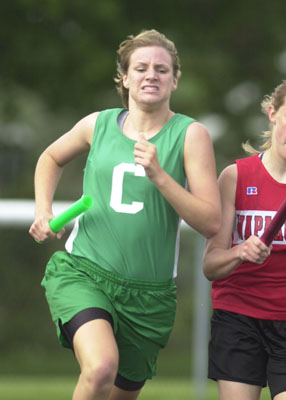 Celina's Brittany Wenning takes the turn during the girls 3200-meter relay on Thursday in Celina at the Western Buckeye League meet. Wenning is one of the top middle-distance runners in the league as the Bulldogs look to win the league title for the 16th straight season.<br>dailystandard.com