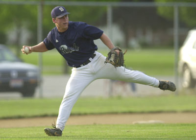 Palm Beach Atlantic's Brad Halvorsen stretches to make the play during Friday's game with Geneva at Jim Hoess Field.<br>dailystandard.com