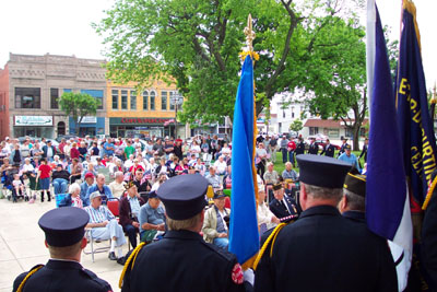 A special Sept. 11 color guard to honor the police and firefighters killed in the wake of the terrorist attacks looks out on the crowd gathered in front of the Mercer County Courthouse for Memorial Day services Monday.<br>dailystandard.com