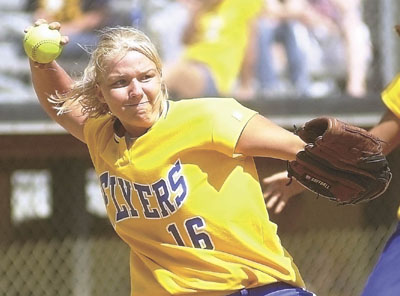 Marion Local's Dana Hartings throws to first during action from Thursday's state semifinal game with Crestline.<br>dailystandard.com