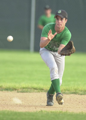 Celina shortstop Nick Gray charges a groundball during Monday's ACME contest against Fort Recovery. Celina won the game, 5-4.<br>dailystandard.com