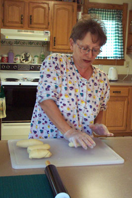 Shirley May rolls out noodle dough for her new business, Buzzard Hill Noodles, sold out of her Willshire home. The dough will make one pound of noodles. The less you knead the dough, the better, she says. <br>dailystandard.com