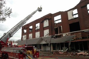 Fire began late Sunday night in the Donnerberg building on Spring Street, St. Marys. Seven fire departments were called in to help contain the blaze. Firefighters expect to remain on the scene most of today attending to possible hot spots.<br>dailystandard.com
