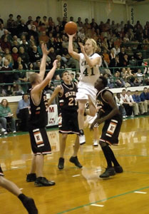 Celina's Brandon Wurster, 41, missed this shot, but the senior hit a game-winning three-pointer for the Bulldogs as the Green and White defated Elida, 31-30 at the Fieldhouse on Friday night.<br>dailystandard.com