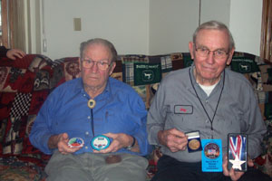Left, Ray Wenning displays medals Battle of the Bulge veterans received during a trip to Europe.<br>Right, Elmer Dorsten  has a purple heart with three cluster from serving at the Battle of the Bulge, the bloodiest land battle of World War II. <br>dailystandard.com