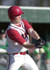 St. Henry's Alan Hartke connects for a two-run single in the third inning, which proved to be the game-winning hit in a 3-2 Redskins win.<br>dailystandard.com
