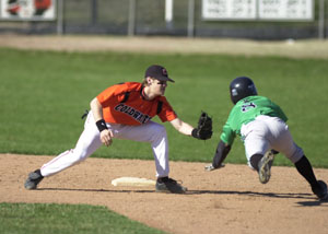 Coldwater second baseman Troy Siefring, left, puts the tag on Celina baserunner Garrett Gray, right, trying to steal during their matchup on Friday. Celina defeated Coldwater, 4-2, for the first loss of the season by the Cavaliers.<br>dailystandard.com