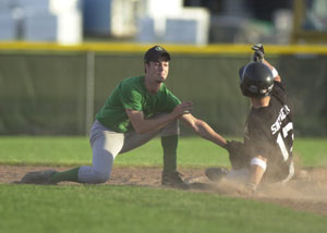 Parkway's Derek Snyder, 13, slides safely into second base during the ACME game against Celina at Eastview Park on Monday night. Parkway defeated Celina, 9-4.<br>dailystandard.com