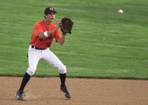 Minster second baseman Nick Wyen gets in front of a groundball for an out during Friday's ACME district contest against Crestview at St. Henry's Wally Post Athletic Complex.<br>dailystandard.com