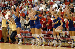 The Marion Local bench reacts in joy during the Division IV district semifinal match on Thursday night at New Bremen High School against New Knoxville. The Flyers defeated the top-seeded Rangers in four games.<br></br>dailystandard.com