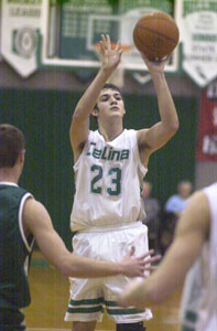 Celina freshman Derek Gagle spots up for an open shot during Saturday's game against Greenville at the Fieldhouse. The Bulldogs won for the first time of the season with a 43-39 triumph over the Green Wave.<br></br>dailystandard.com