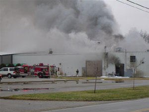 Heavy smoke billows from QualiTech Metal Finishers Inc., 441 Grand Lake Road, Celina, as firefighters from Celina, Coldwater and the city of St. Marys knock down flames inside the building Monday afternoon. An investigator from the Ohio State Fire Marshal's Office was to arrive today in hopes of determining the cause.<br></br>dailystandard.com