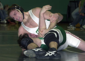 Celina's Corey Zizelman, top, gets a tight grip on Van Wert's Ben Roop, bottom, during their 171-pound match on Monday night in Western Buckeye League action. Zizelman pinned Roop at the 3:18 mark to win his match but Van Wert defeated Celina, 41-30.<br></br>dailystandard.com