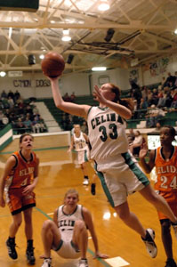 Celina's Betsy Hone, 33, glides to the basket for two of her team-high 15 points during the game against Elida on Thursday night at the Fieldhouse. Elida defeated Celina, 56-50.<br></br>dailystandard.com
