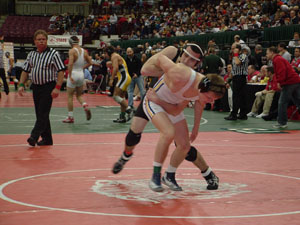 Coldwater's Andy Schmidt tries to take down Brookfield's Ross Tice in Saturday's 152-pound Division III seventh-place match at the 69th State Wrestling Championship in Columbus. Tice won the match, but Schmidt became the second Cavalier wrestler to place at the state meet.<br></br>dailystandard.com