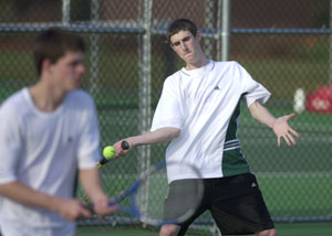 Celina second doubles player Matt Stetler, right, gets set for forehand as teammate Kyle Everman, left, looks on during their match on Thursday. Stetler and Everman won to clinch a 3-2 victory for Celina over Lehman.<br></br>dailystandard.com