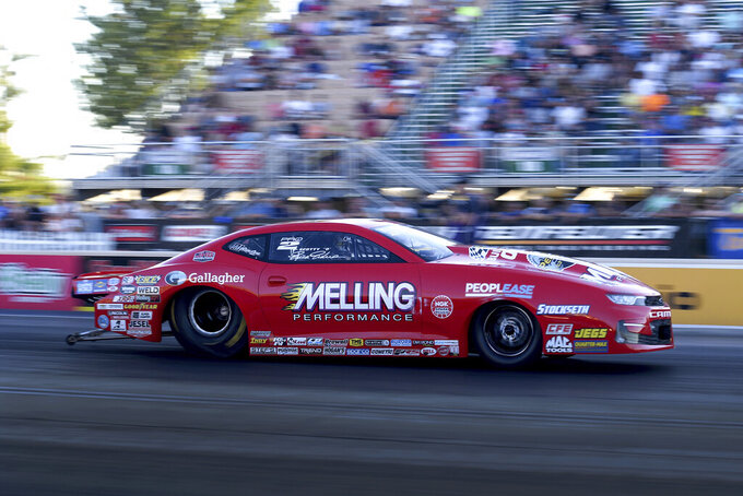 In this photo provided by the NHRA, Erica Enders drives in Pro Stock qualifying for the Summit Racing Equipment NHRA Nationals drag races Friday, June 24, 2022, at Summit Racing Equipment Motorsports Park in Norwalk, Ohio. (Marc Gewertz/NHRA via AP)