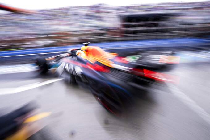 Red Bull Racing Max Verstappen of the Netherlands drives out of his garage during the third practice session at the Formula One Canadian Grand Prix in Montreal, Saturday, June 18, 2022. (Paul Chiasson/The Canadian Press via AP)