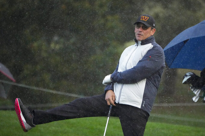 Ron Rivera reacts after his putt on the 16th green of the Pebble Beach Golf Links during the third round of the AT&T Pebble Beach Pro-Am golf tournament in Pebble Beach, Calif., Sunday, Feb. 5, 2023. (AP Photo/Godofredo A. Vásquez)