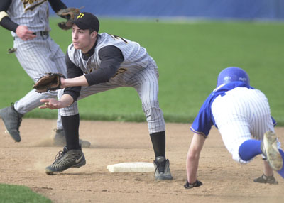 Marion Local's Mitch Thobe, right, gets caught stealing as Parkway's Jake Long waits for him on second base. Parkway defeated Marion Local, 4-0.<br>dailystandard.com