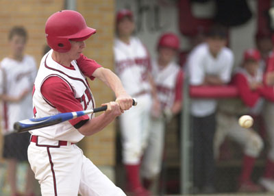 St. Henry's Bryan Post rips a double during the fourth inning for the Redskins in their matchup against Fort Recovery on Tuesday. Post had two hits on the day with two RBI to help St. Henry to a 2-0 win over the Indians.<br>dailystandard.com
