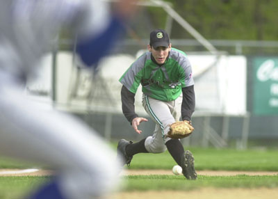 Celina's Brian Geise gets down to make the play on the ball during Tuesday's WBL matchup with Defiance at Eastview Park.<br>dailystandard.com