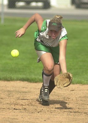 Celina's Kelli Williams charges hard to catch the ball in the air for an out just before it hits the ground during Division II district  semifinals action at Bath High School against the Wildkittens. Bath scored one run in the game but it was enough to knock off Celina, 1-0 in 10 innnings.<br>dailystandard.com