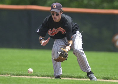 Coldwater's Chad Geier makes the play during Saturday's game with Patrick Henry. Geier scored the winning run for the Cavs.<br>dailystandard.com