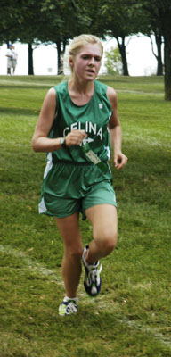 Celina's Katelin Smith rounds the track during the Celina Rotary Cross Country Invitational held on Saturday morning. Smith won the Division I girls race with a time of 23:13 to help Celina win the team title.<br>dailystandard.com