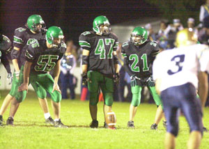 Celna's Brandon Ley, 47, gets ready to kick off the ball moments after kicking the game-winning 32-yard field goal for the Bulldogs in a 17-14 win over Lima Bath.<br>dailystandard.com