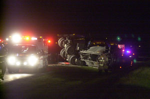 A semitrailer lies on its side on state Route 29 at Riley Road following a serious injury accident just before 9 p.m. Monday. A 17-year-old Celina girl, Jamie Siefker, remained in serious condition this morning at Miami Valley Hospital, Dayton, after she drove a pickup truck through the intersection and was struck by the westbound semitrailer.<br>dailystandard.com