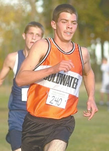 Coldwater's David Wilker leads Lehman's Tony Reiss en route to winning the boys' varsity race at the Lions Invitational.<br>dailystandard.com