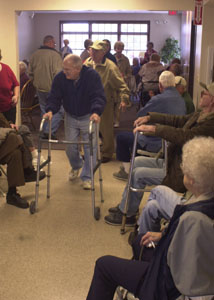 Senior citizens wait in line for a flu shot at the New Bremen Senior Citizen Center on Tuesday. As of this morning, Auglaize County Health Department had a small supply of the vaccine left while Mercer County ran out last week.<br>dailystandard.com