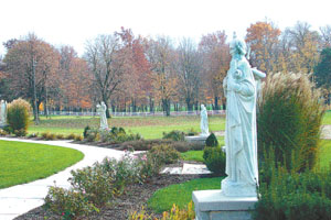 Statues line a circular path near the Maria Stein Center. Some have been donated in recent years while others were moved from the picturesque grounds along St. Johns Road. <br>dailystandard.com