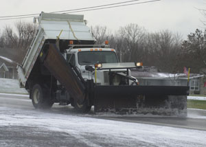 The Grand Lake St. Marys area turned white this morning as the first snow of the season fell. A snowplow removes snow off state Route 703 this morning, as motorists make their way to work. Dennis Howick, local weather forecaster predicts snow flurries will continue this afternoon, tonight and Tuesday.<br>dailystandard.com
