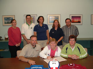 Celina senior Jamie Siefker, seated center, will play both volleyball and softball for NAIA school The University of the Cumberlands. Seated with Jamie are parents Bill and Janet Siefker. Standing in the back are, from left, Celina volleyball coach Nikki Etzler, Celina head softball coach Brian Stetler, Cumberland assistant softball coach Amanda Walton, Cumberland head softball coach Angie Dean and Celina assistant softball coach Dean Liggett.<br>dailystandard.com