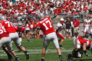 Ohio State's Todd Boeckman, 17, fires a pass to Anthony Gonzalez, 11, during the third quarter of Saturday's season opener with Miami University. Boeckman completed the pass to Gonzalez and followed with his first career touchdown pass one play later to Ted Ginn Jr.<br>dailystandard.com