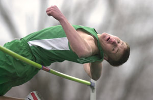 Celina's Erik Chapin leans over the bar during the high jump competition on Saturday at the Celina Invitational. Chapin won the high jump and the 110 hurdles to help the Bulldogs to a second-place finish behind Western Buckeye League rival Defiance.<br></br>dailystandard.com
