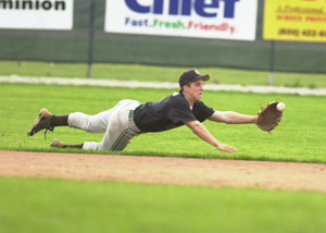 Celina's John Bonvillian dives to make a great catch for an out in the fifth inning of the Bulldogs' game against St. Marys on Tuesday at Eastview. St. Marys started out WBL play with an 8-2 win over Celina.<br></br>dailystandard.com