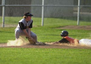 Coldwater's Tyler James, right, slides safely into third base just ahead of the tag by Parkway's Levon Archer, left, during their ACME contest on Wednesday at Veterans Field. Parkway won, 7-3.<br></br>dailystandard.com