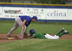Grand Lake centerfielder Quentin Brown, right, is tagged out trying to steal second base during the second inning of a Great Lakes Summer Collegiate League contest on Wednesday night at Jim Hoess Field. Cincinnati defeated Grand Lake, 4-3, improving to a GLSCL-best 9-3 record.<br></br>dailystandard.com
