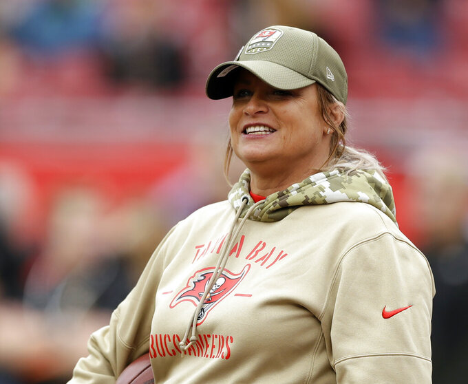 FILE - Tampa Bay Buccaneers coach Lori Locust looks on before an NFL football game against the New Orleans Saints, Nov. 17, 2019, in Tampa, Fla. Last year, Buccaneers assistant defensive line coach Locust and assistant strength and conditioning coach Maral Javadifar became the first female coaches on a team to win the Super Bowl. (AP Photo/Chris O'Meara, File)