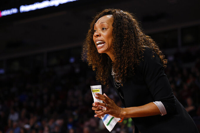Kentucky head coach Kyra Elzy directs her team against South Carolina during the first half of an NCAA college basketball game in Columbia, S.C., Thursday, Feb. 2, 2023. (AP Photo/Nell Redmond)