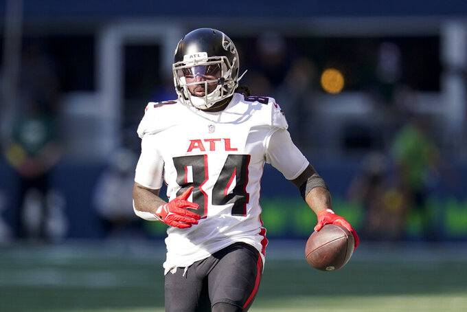 Atlanta Falcons running back Cordarrelle Patterson runs with the ball during the second half of an NFL football game against the Atlanta Falcons, Sunday, Sept. 25, 2022, in Seattle. (AP Photo/Ashley Landis)