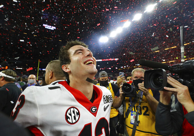 Georgia quarterback Stetson Bennett reacts to winning the College Football Playoff championship game, late Monday, Jan. 10, 2022, in Indianapolis, against Alabama. (Curtis Compton/Atlanta Journal-Constitution via AP)